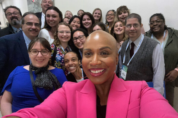 Congresswoman Ayanna Pressley takes a selfie with the Massachusetts delegation