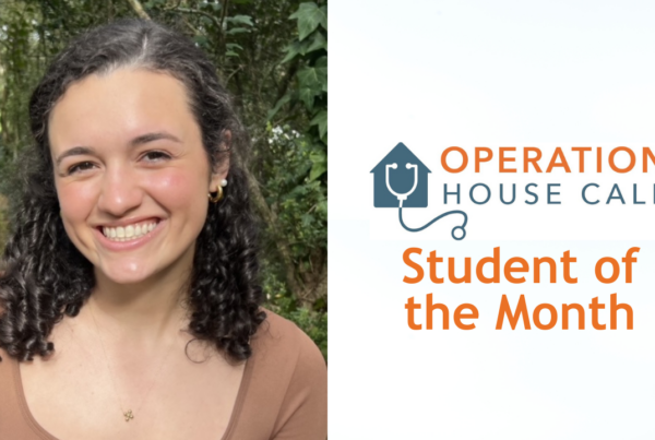 a woman smiling next to a sign that says operation house call student of the month