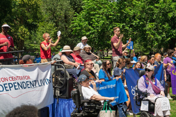 a large group of people in a park