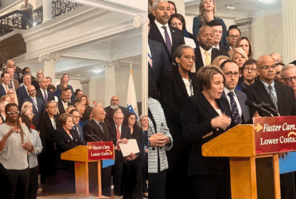 a group of people standing in front of a podium
