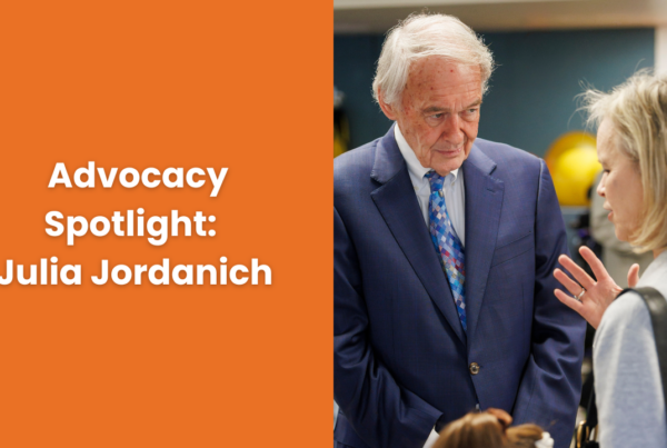 a man in a suit talking to a woman