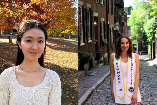 a woman standing in front of a brick building