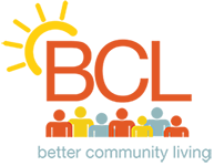 the bcl logo with a group of people standing in front of it