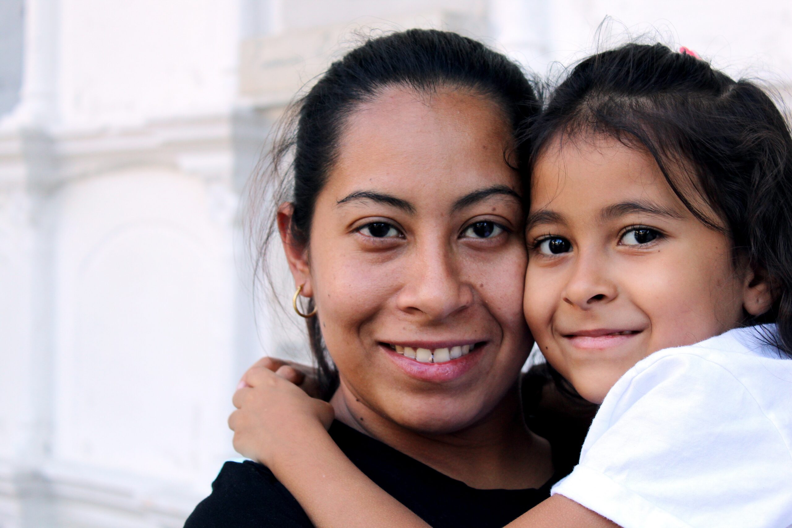 A mother holding her child